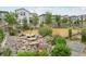 Beautiful landscaped backyard with water feature at 8926 Swan River St, Littleton, CO 80125