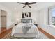 Well-lit bedroom with a modern bed and matching lamps. Furnishings create a relaxing atmosphere at 8926 Swan River St, Littleton, CO 80125
