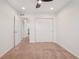 Bedroom with neutral carpet, ceiling fan and large closet at 8926 Swan River St, Littleton, CO 80125