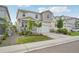 Lovely two-story home showcasing a two-car garage, a covered porch, and a manicured front yard at 8926 Swan River St, Littleton, CO 80125