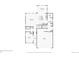 First floor plan featuring living spaces and garage at 8926 Swan River St, Littleton, CO 80125