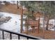 View of a small wooden platform in the woods at 2492 Baldy Ln, Evergreen, CO 80439