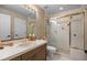 Bathroom with a shower, vanity, and tile floor at 2492 Baldy Ln, Evergreen, CO 80439