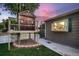 Unique backyard view featuring a charming treehouse and well-maintained landscaping at 4329 S Clarkson St, Englewood, CO 80113