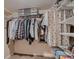 Walk in closet with wire shelving and hanging rods for optimal clothing and storage capacity at 4329 S Clarkson St, Englewood, CO 80113