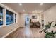 Spacious living area with hardwood floors and a large window, bright and open at 4329 S Clarkson St, Englewood, CO 80113