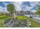 Expansive backyard with lush lawn, mature trees, garden, and a pool at 7401 Deerfield Rd, Longmont, CO 80503