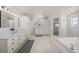 Luxurious bathroom with soaking tub and walk-in shower at 7401 Deerfield Rd, Longmont, CO 80503