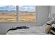Bedroom with stunning mountain and landscape views at 7401 Deerfield Rd, Longmont, CO 80503