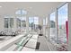 Bright home gym with sliding glass doors, offering scenic views at 7401 Deerfield Rd, Longmont, CO 80503
