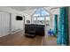 Relaxing indoor spa with a hot tub, shower, and mountain views at 7401 Deerfield Rd, Longmont, CO 80503