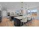 Spacious kitchen with large island, modern appliances, and ample counter space at 7401 Deerfield Rd, Longmont, CO 80503