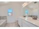 Double vanity bathroom with modern fixtures at 6906 Kendrick Ln, Arvada, CO 80007