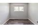 Bedroom with hardwood floors and natural light at 1202 S Troy St, Aurora, CO 80012