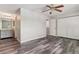 Spacious bedroom with ceiling fan and hardwood flooring at 1202 S Troy St, Aurora, CO 80012
