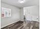 Neutral bedroom offering ample space, gray floors, and closet at 1202 S Troy St, Aurora, CO 80012