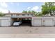 Carport and garages provide ample off-street parking for residents and guests at 1202 S Troy St, Aurora, CO 80012