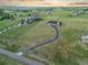 Aerial view of a home on a spacious lot with lush greenery at 3124 Antelope Ridge Trl, Parker, CO 80138