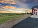 Backyard view showcasing the expansive yard, scenic views, and the home's exterior at 3124 Antelope Ridge Trl, Parker, CO 80138