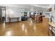 Spacious basement includes an entertainment area with a fireplace and a sleek bar at 3124 Antelope Ridge Trl, Parker, CO 80138