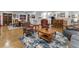 Basement features a living area, dining set, bar, and stylish furniture at 3124 Antelope Ridge Trl, Parker, CO 80138
