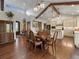 Open-concept dining room featuring a large table and elegant decor at 3124 Antelope Ridge Trl, Parker, CO 80138