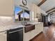Kitchen featuring a copper sink, tile backsplash, and stainless steel appliances at 3124 Antelope Ridge Trl, Parker, CO 80138