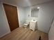 Cozy basement bathroom with a vanity, toilet, and modern fixtures, providing convenience and functionality at 11623 E Virginia Dr, Aurora, CO 80012