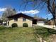Charming single-story brick home with a well-maintained lawn and attached one car garage at 11623 E Virginia Dr, Aurora, CO 80012