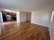 Bright and airy living room featuring gleaming hardwood floors, neutral walls, and ample natural light at 11623 E Virginia Dr, Aurora, CO 80012