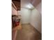 Basement storage room with shelving, offering an organized space for storing items in this home at 11623 E Virginia Dr, Aurora, CO 80012