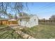 Detached garage with fenced backyard, providing secure parking and outdoor space at 1649 Lima St, Aurora, CO 80010