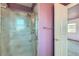 Bathroom with a shower and a textured glass shower door at 8839 Winona Ct, Westminster, CO 80031