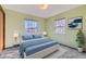 Virtually staged bedroom with a light and airy feel, featuring a queen bed at 8839 Winona Ct, Westminster, CO 80031