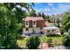 Aerial view shows a home's back yard, including a patio, deck, and pergola at 1813 Pikes Peak St, Erie, CO 80516