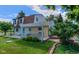 Exterior showing backyard of home featuring covered patio and well-manicured lawn at 1813 Pikes Peak St, Erie, CO 80516