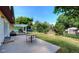 Backyard featuring lush lawn, mature trees, privacy fence, pergola and a shed at 1813 Pikes Peak St, Erie, CO 80516