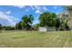 Spacious grounds with well-maintained lawns and outbuildings at 1813 Pikes Peak St, Erie, CO 80516