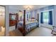 Spacious main bedroom featuring a four poster bed and bright natural light at 1813 Pikes Peak St, Erie, CO 80516