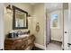 Elegant bathroom with ornate vanity and a shower at 26269 Richmond Hill Rd, Conifer, CO 80433