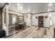 Charming dining area with a round table and wood floors at 26269 Richmond Hill Rd, Conifer, CO 80433