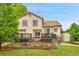 Exterior view of home featuring a deck, an enclosed yard and an upper story at 13008 Grove Way, Broomfield, CO 80020