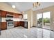 Modern kitchen features stainless steel appliances, white countertops, and plenty of cabinet space at 13008 Grove Way, Broomfield, CO 80020