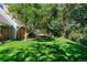 Large backyard showcasing a well-maintained lawn and established landscaping for a private outdoor retreat at 7001 S Newport St, Centennial, CO 80112