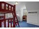 bedroom features bunk beds, built-in drawers, and wainscoting at 7001 S Newport St, Centennial, CO 80112