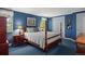 Relaxing bedroom with wooden furniture, matching nightstands, and beautiful white trim at 7001 S Newport St, Centennial, CO 80112