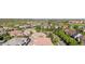 Expansive aerial shot of the neighborhood featuring lush green spaces, varied rooftops, and a peaceful environment at 22933 E Ontario Dr # 105, Aurora, CO 80016