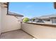 Balcony view with views of neighboring rooftops against a blue sky at 22933 E Ontario Dr # 105, Aurora, CO 80016