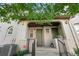 Charming townhome entrance with dual entry doors, fresh plants, and inviting curb appeal at 22933 E Ontario Dr # 105, Aurora, CO 80016