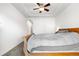 Bedroom interior featuring a wooden bed and neutral wall colors at 22933 E Ontario Dr # 105, Aurora, CO 80016